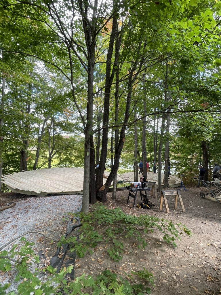 two circular wood platforms in the trees